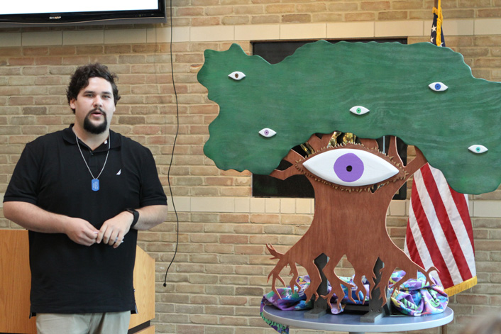 MA Synthesis- Austin with a sculpted tree with eyes 