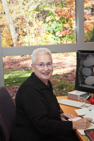 Diane Blau at desk