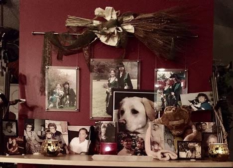 Altar with photographs and candles.