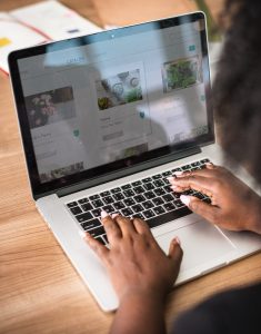 Stock photo of hands typing on a computer.