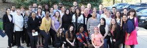 Photo of a large group of MSP students posing after Psi Chi inductions