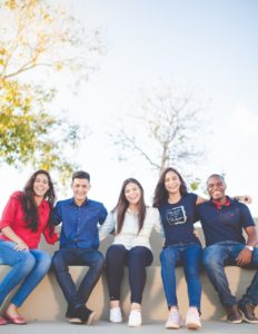 Group of young people smiling.