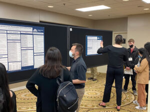 Photo of Paul Farley presenting poster