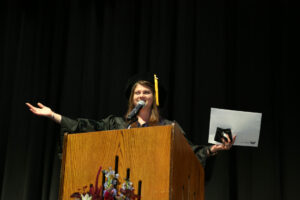 Doctorate student speaking at a podium