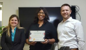 Photo of Ashley Kierpaul, Tracie Webb, and Director of Clinical Training Dr. Dustin Shepler