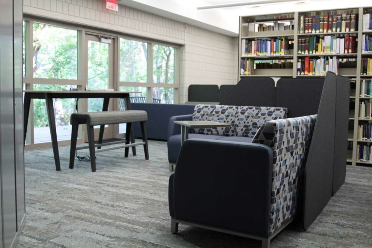 Photo of new library furniture featuring L shaped couches.