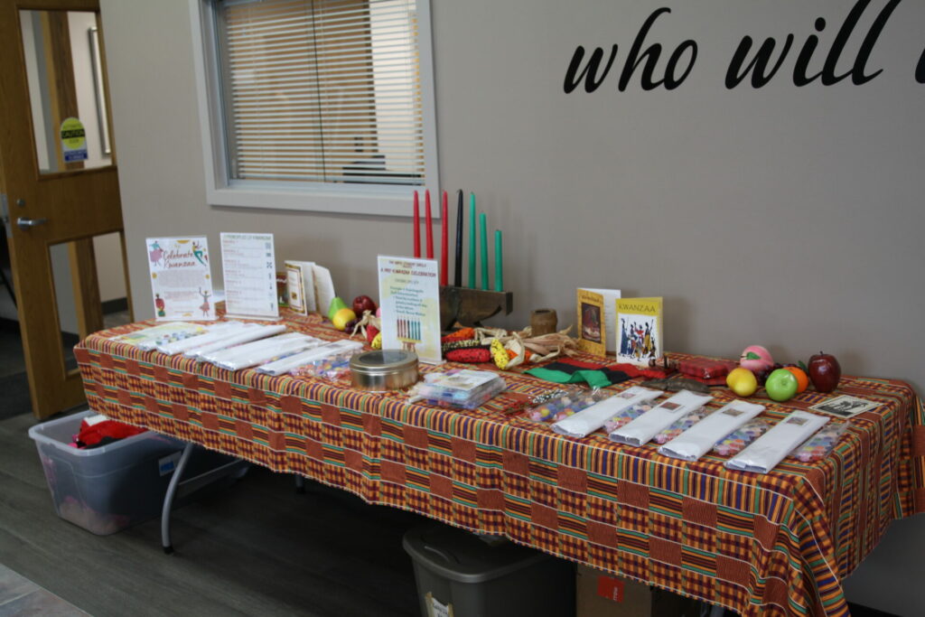 Traditional kwanza table setting with activities and informational materials.